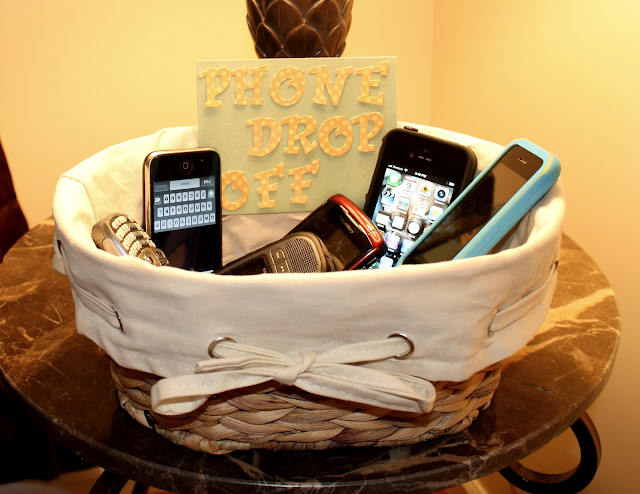 Fabric-lined basket with cell phones inside